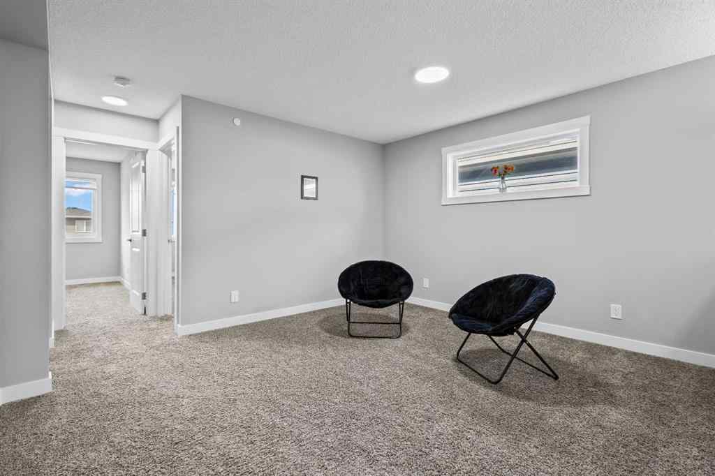 MLS® A2241942 - 75 Howse Crescent NE in Livingston Calgary, Residential