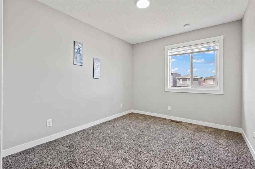 MLS® A2241942 - 75 Howse Crescent NE in Livingston Calgary, Residential