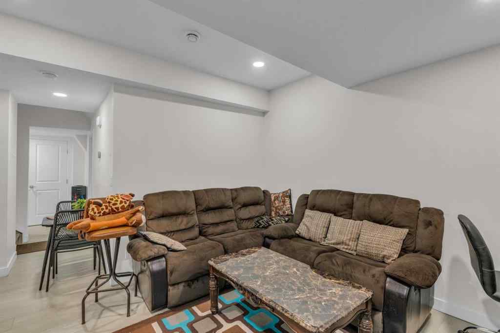 MLS® A2242007 - 203 Lucas Close NW in Livingston Calgary, Residential