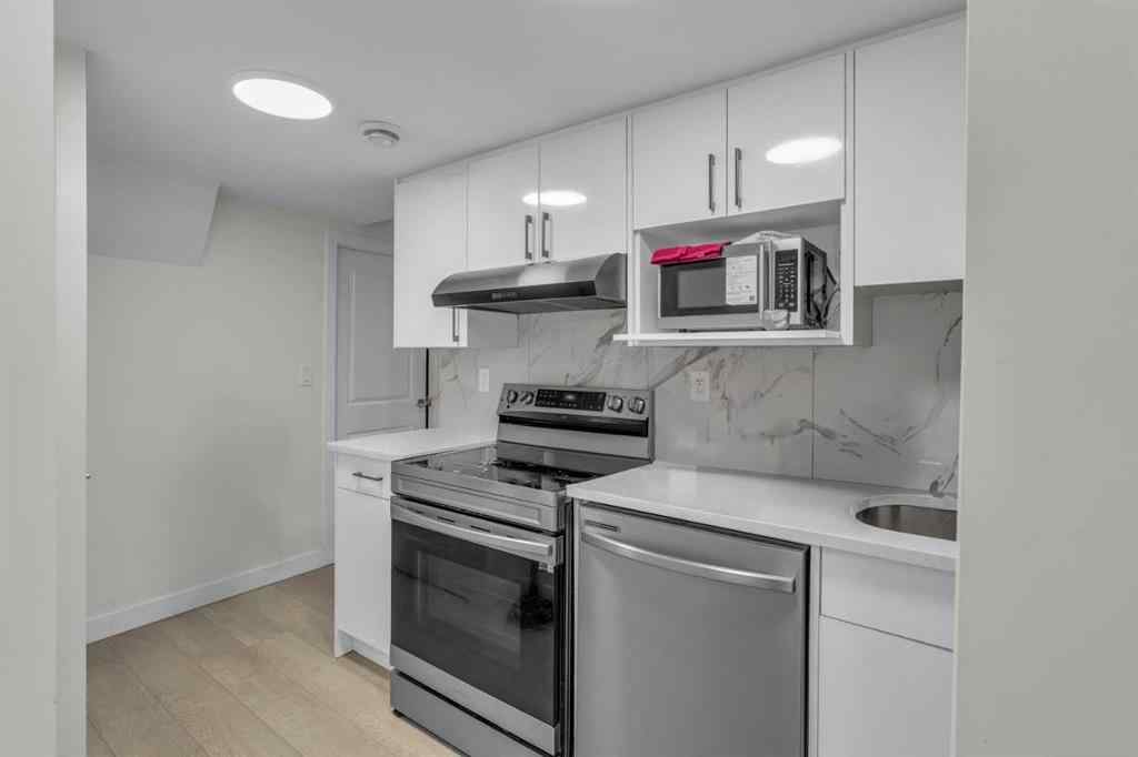 MLS® A2242007 - 203 Lucas Close NW in Livingston Calgary, Residential
