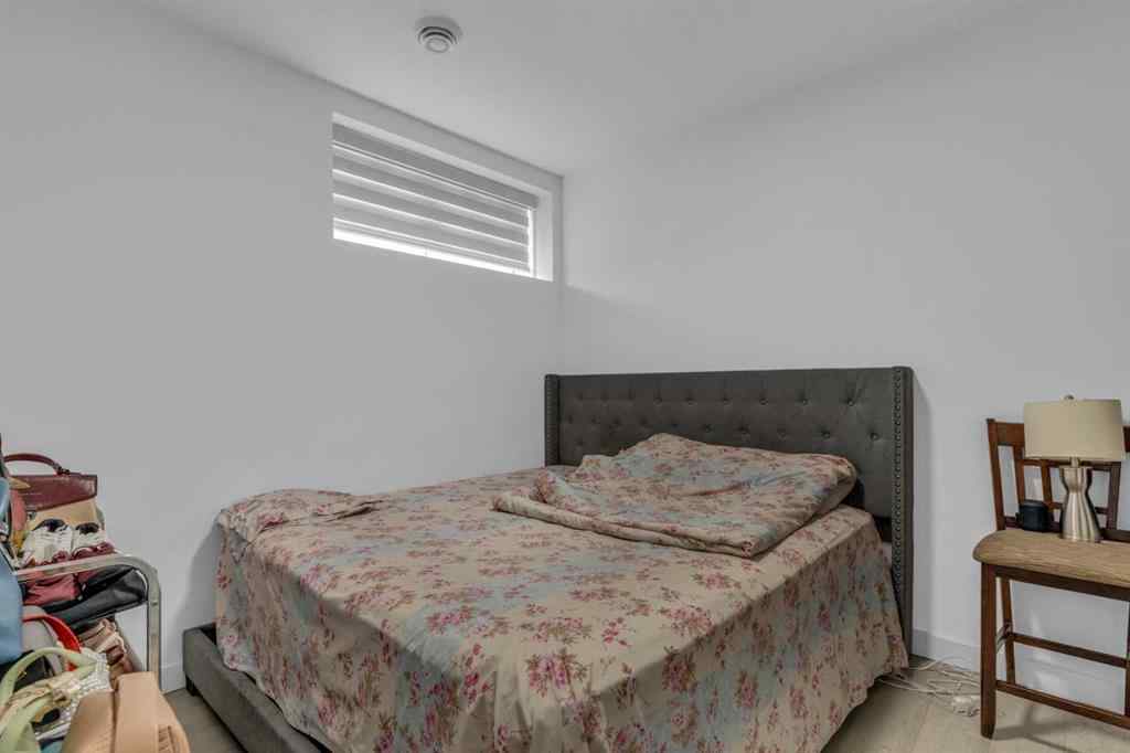 MLS® A2242007 - 203 Lucas Close NW in Livingston Calgary, Residential