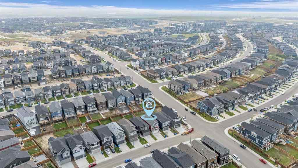 MLS® A2242007 - 203 Lucas Close NW in Livingston Calgary, Residential