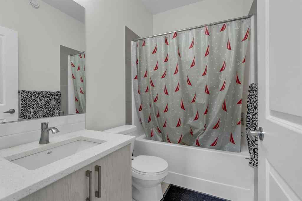 MLS® A2242007 - 203 Lucas Close NW in Livingston Calgary, Residential