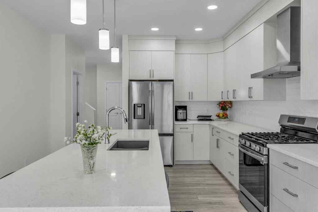 MLS® A2242007 - 203 Lucas Close NW in Livingston Calgary, Residential