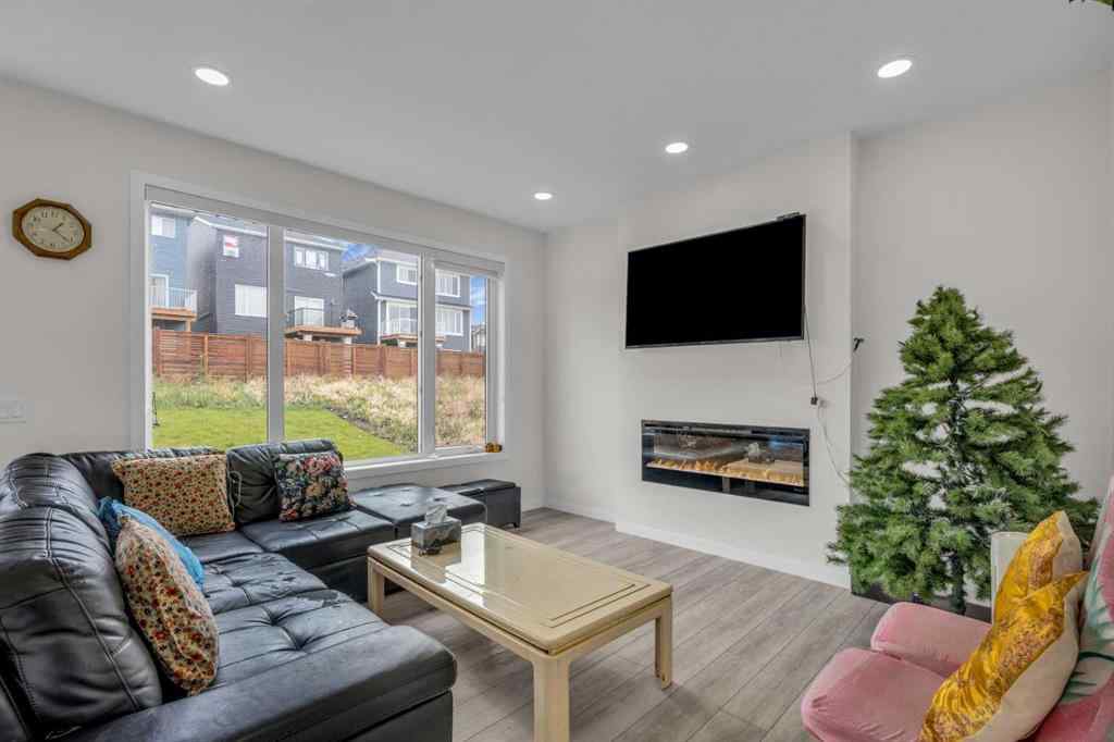 MLS® A2242007 - 203 Lucas Close NW in Livingston Calgary, Residential