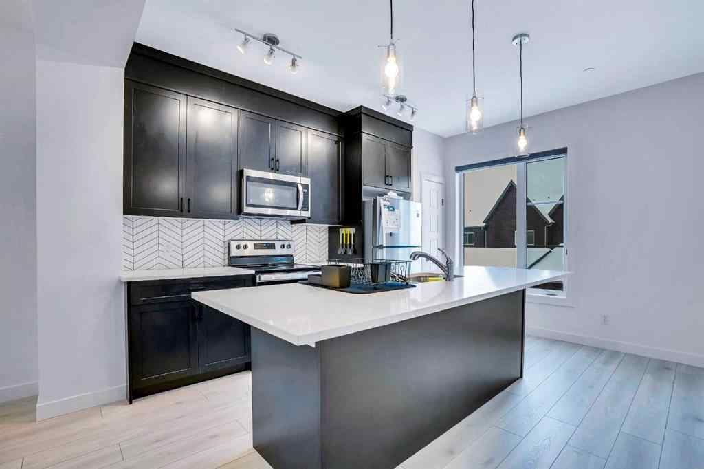 MLS® A2242012 - 160 Livingston Common NE in Livingston Calgary, Residential