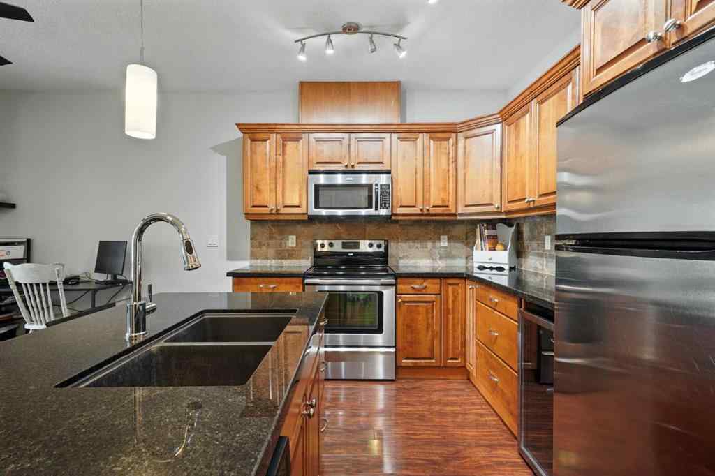 MLS® A2242032 - Unit #203 4707 50 Street  in Downtown Sylvan Lake, Residential