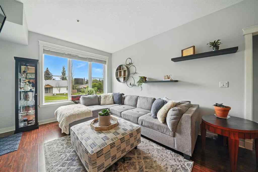 MLS® A2242032 - Unit #203 4707 50 Street  in Downtown Sylvan Lake, Residential