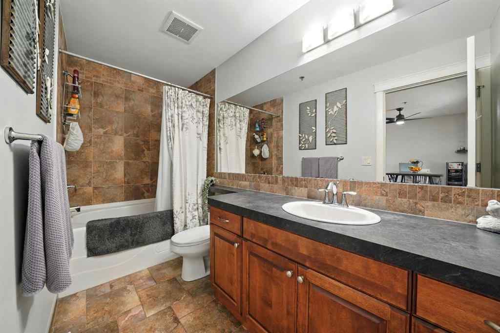 MLS® A2242032 - Unit #203 4707 50 Street  in Downtown Sylvan Lake, Residential