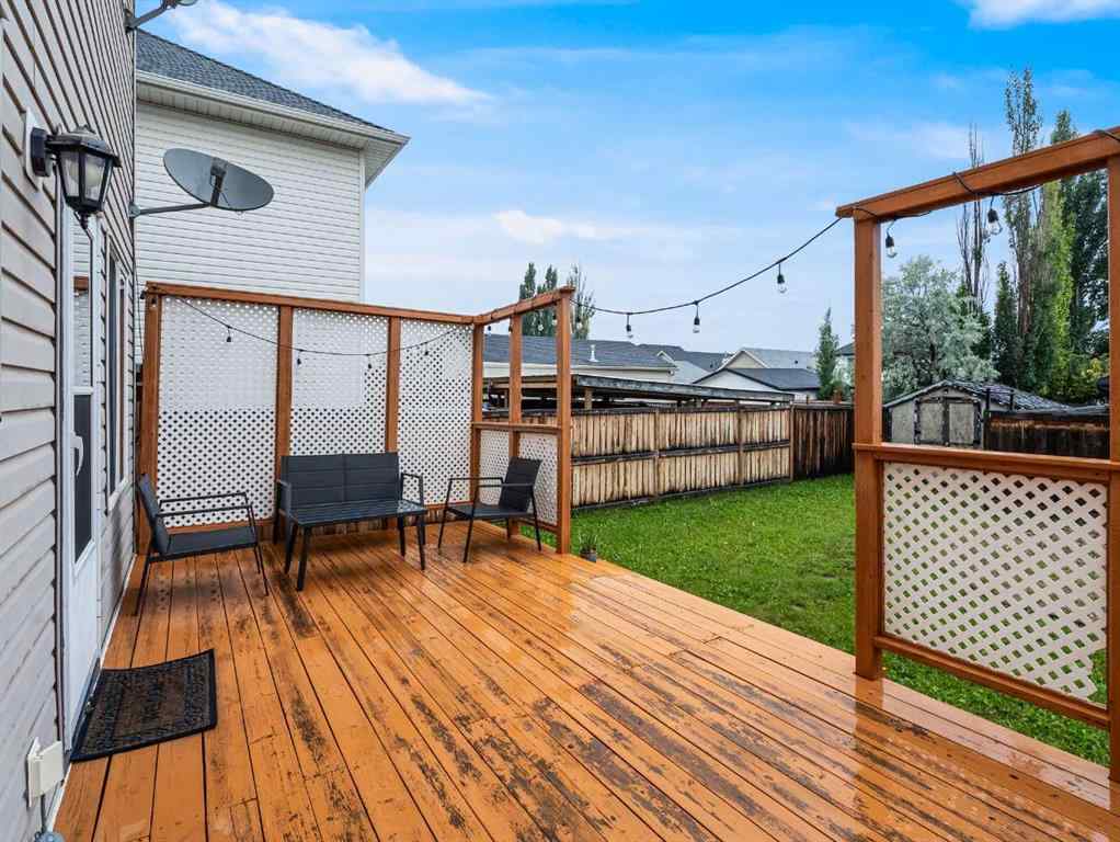 MLS® A2242056 - 68 Bridleridge Gardens SW in Bridlewood Calgary, Residential