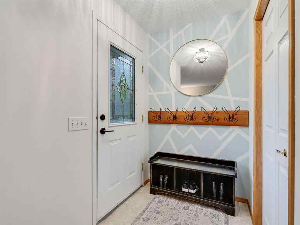 MLS® A2242056 - 68 Bridleridge Gardens SW in Bridlewood Calgary, Residential