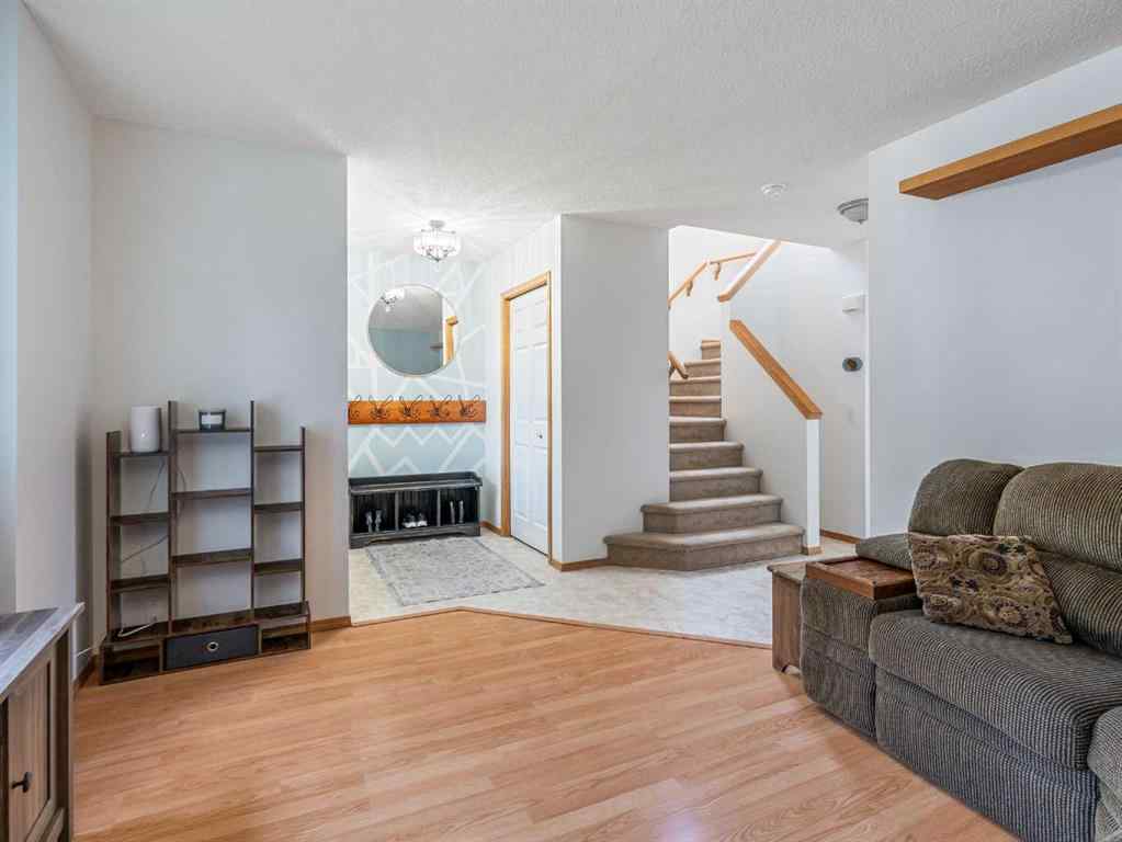 MLS® A2242056 - 68 Bridleridge Gardens SW in Bridlewood Calgary, Residential