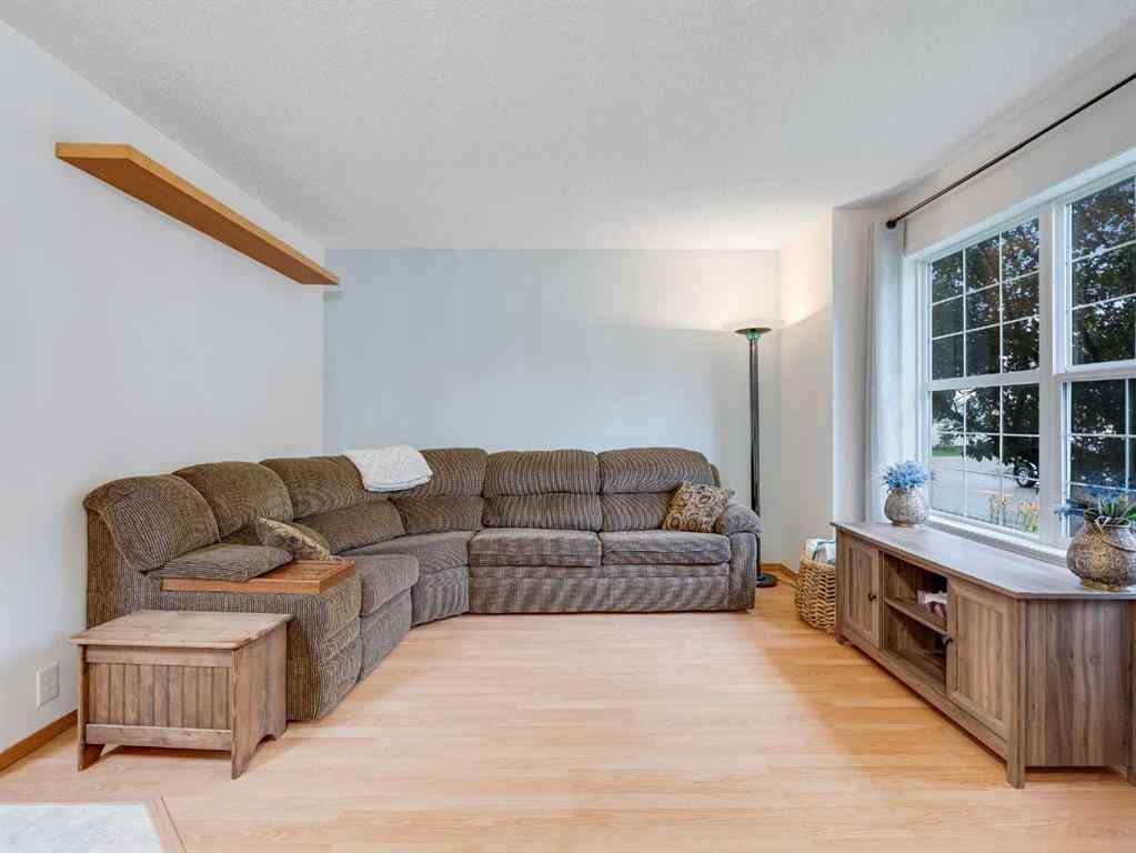 MLS® A2242056 - 68 Bridleridge Gardens SW in Bridlewood Calgary, Residential