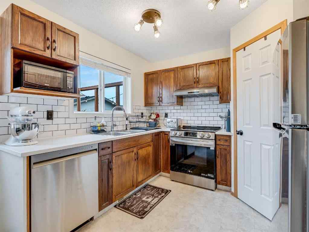 MLS® A2242056 - 68 Bridleridge Gardens SW in Bridlewood Calgary, Residential