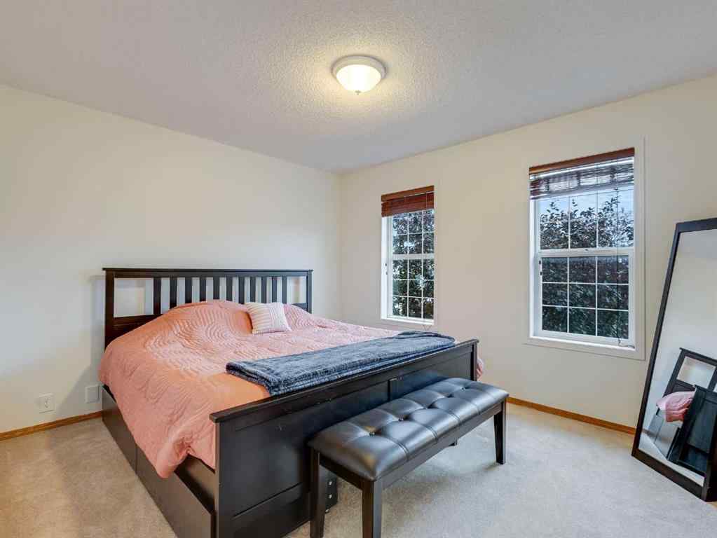 MLS® A2242056 - 68 Bridleridge Gardens SW in Bridlewood Calgary, Residential
