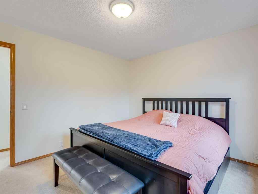 MLS® A2242056 - 68 Bridleridge Gardens SW in Bridlewood Calgary, Residential