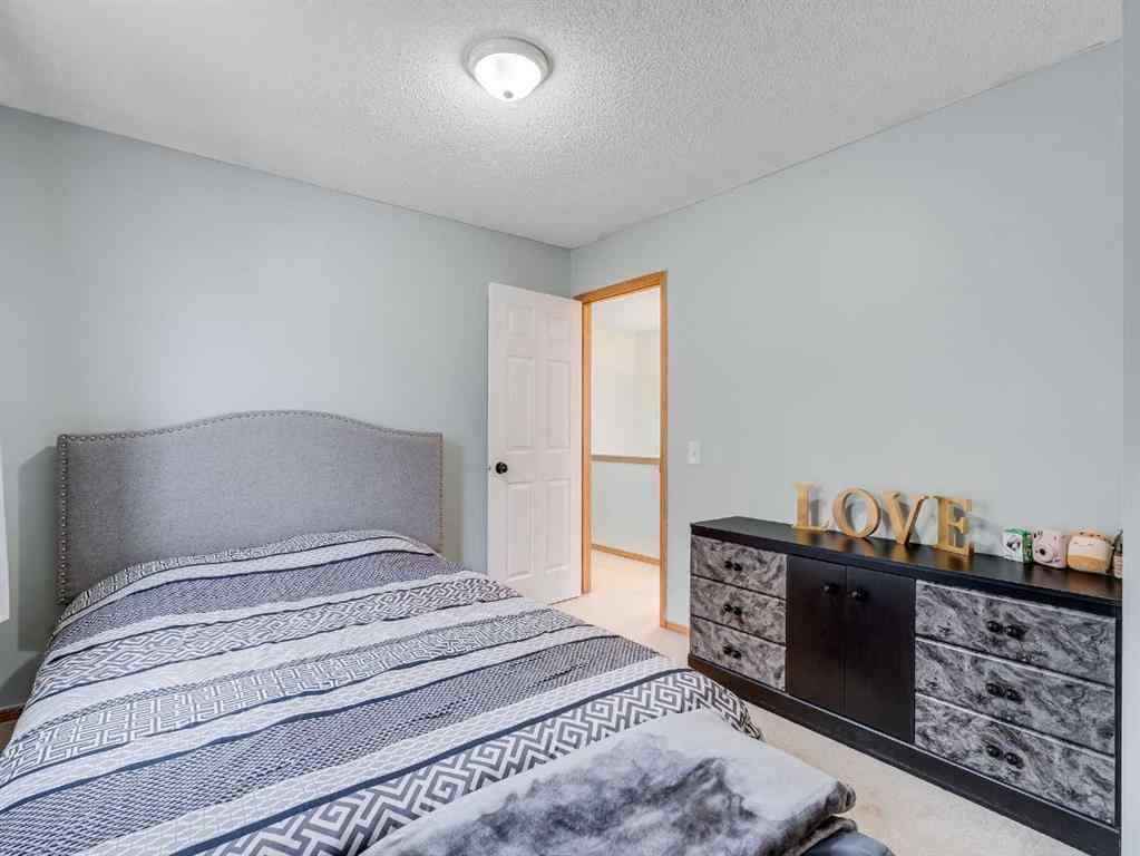 MLS® A2242056 - 68 Bridleridge Gardens SW in Bridlewood Calgary, Residential