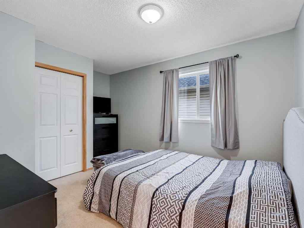 MLS® A2242056 - 68 Bridleridge Gardens SW in Bridlewood Calgary, Residential