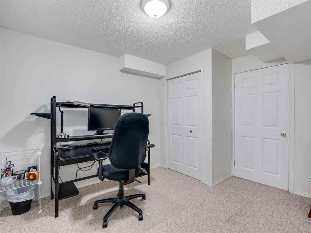 MLS® A2242056 - 68 Bridleridge Gardens SW in Bridlewood Calgary, Residential