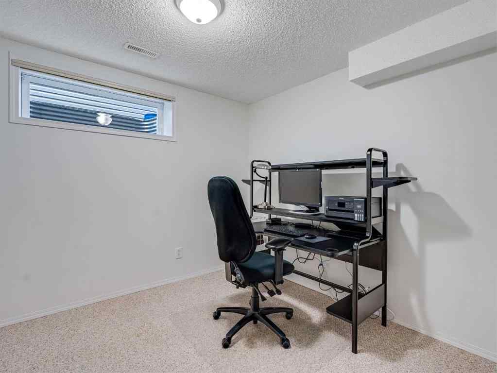 MLS® A2242056 - 68 Bridleridge Gardens SW in Bridlewood Calgary, Residential