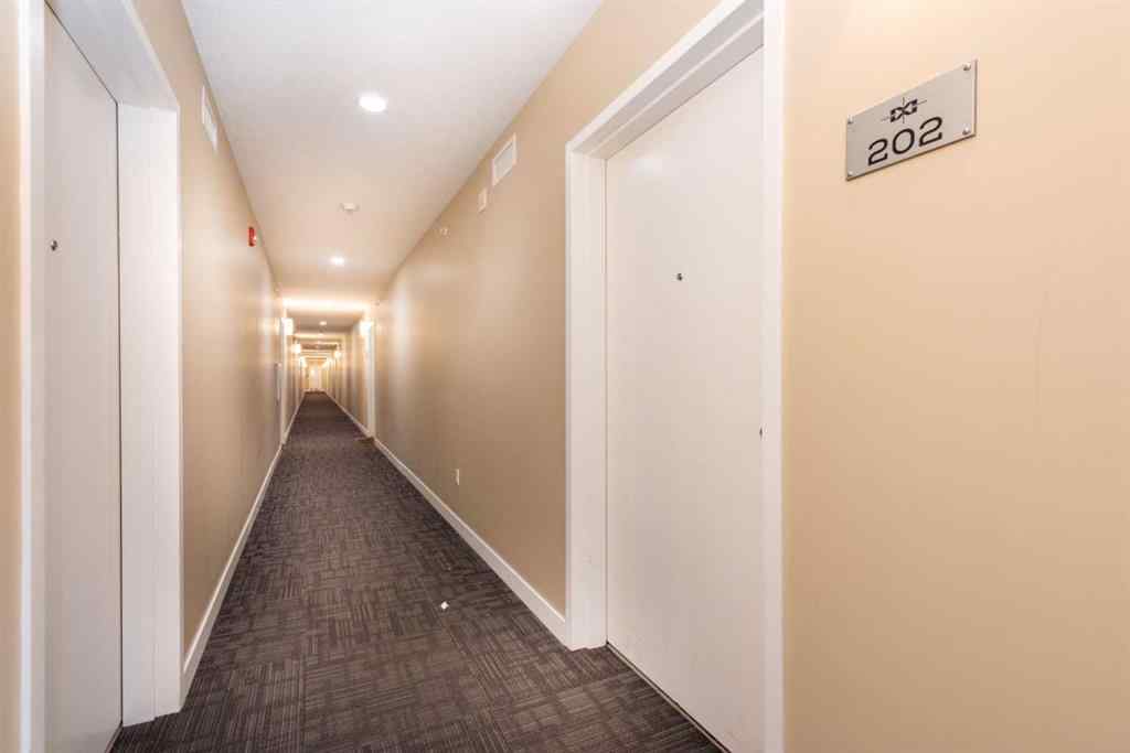 MLS® A2242062 - Unit #202 15233 1 Street SE in Midnapore Calgary, Residential