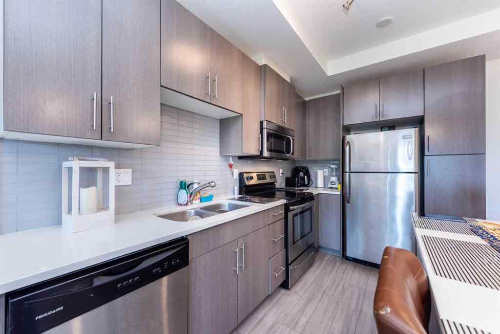 MLS® A2242062 - Unit #202 15233 1 Street SE in Midnapore Calgary, Residential