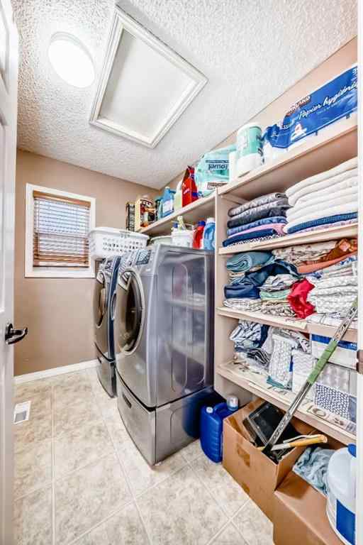 MLS® A2242078 - 148 Saddlecrest Gardens NE in Saddle Ridge Calgary, Residential