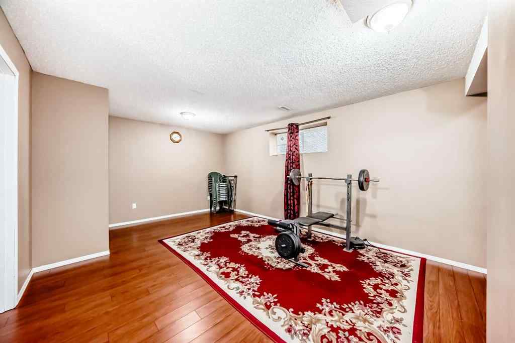 MLS® A2242078 - 148 Saddlecrest Gardens NE in Saddle Ridge Calgary, Residential