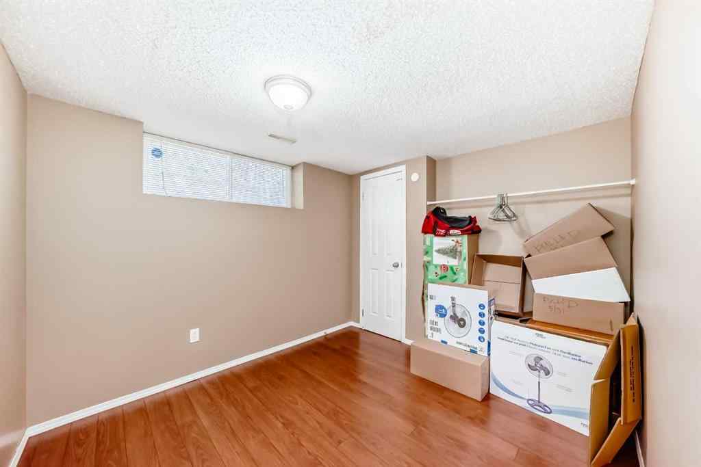 MLS® A2242078 - 148 Saddlecrest Gardens NE in Saddle Ridge Calgary, Residential