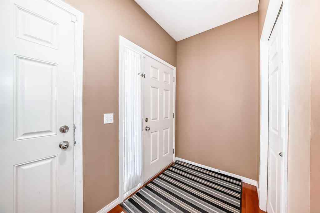 MLS® A2242078 - 148 Saddlecrest Gardens NE in Saddle Ridge Calgary, Residential