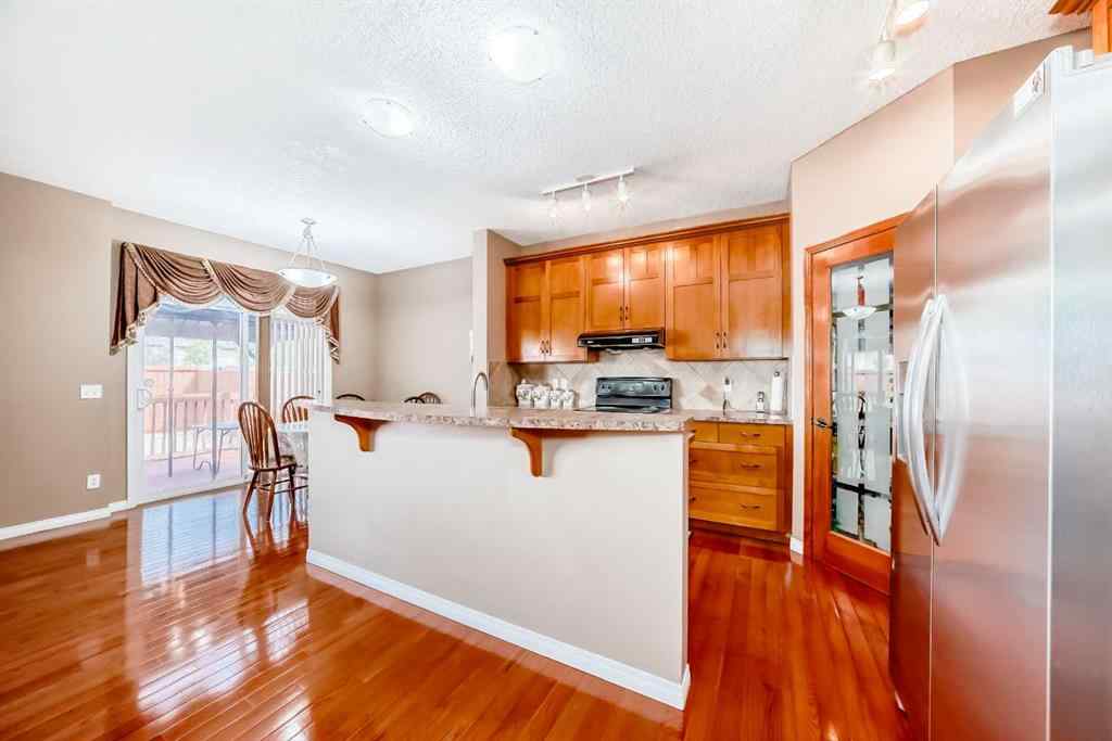 MLS® A2242078 - 148 Saddlecrest Gardens NE in Saddle Ridge Calgary, Residential