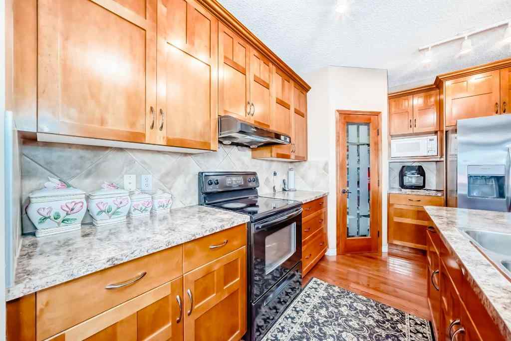 MLS® A2242078 - 148 Saddlecrest Gardens NE in Saddle Ridge Calgary, Residential