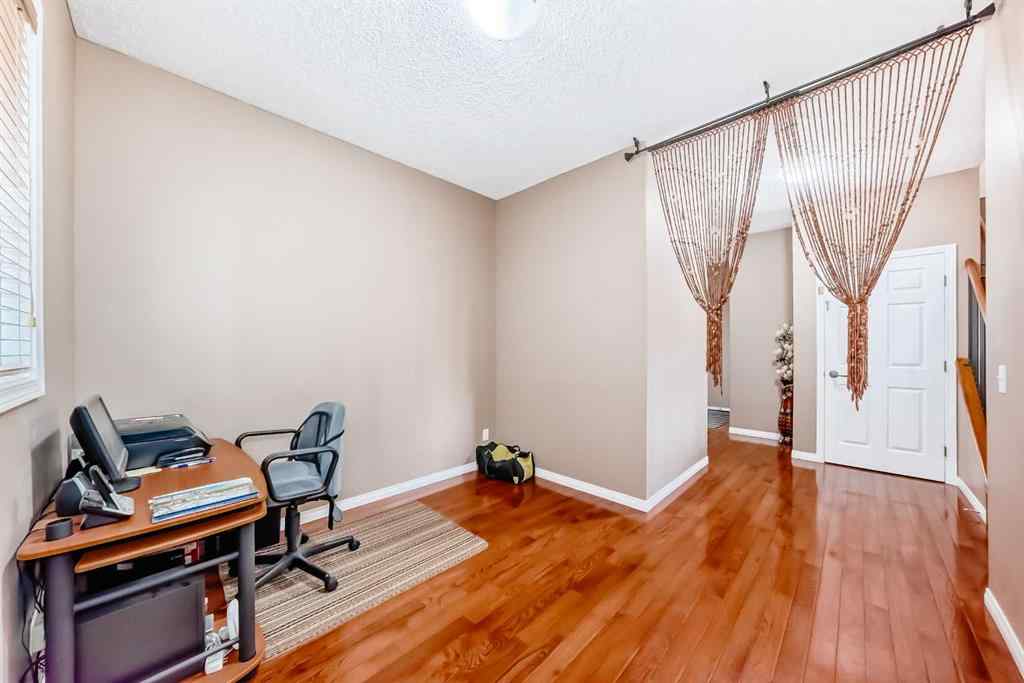 MLS® A2242078 - 148 Saddlecrest Gardens NE in Saddle Ridge Calgary, Residential