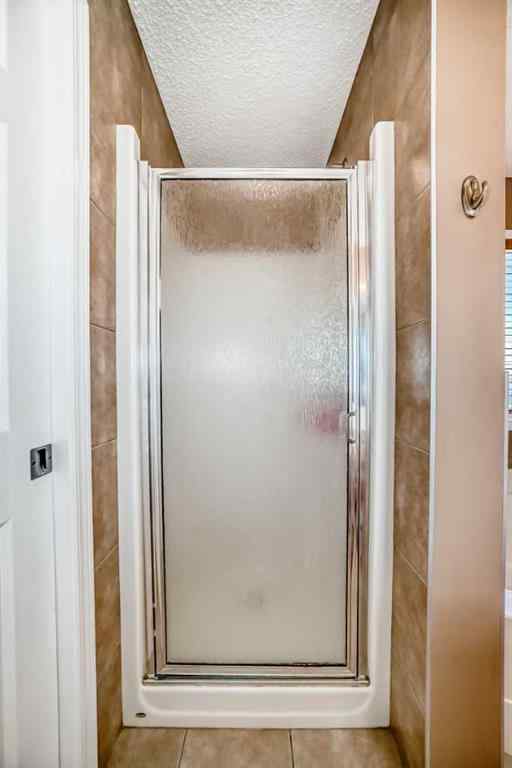MLS® A2242078 - 148 Saddlecrest Gardens NE in Saddle Ridge Calgary, Residential