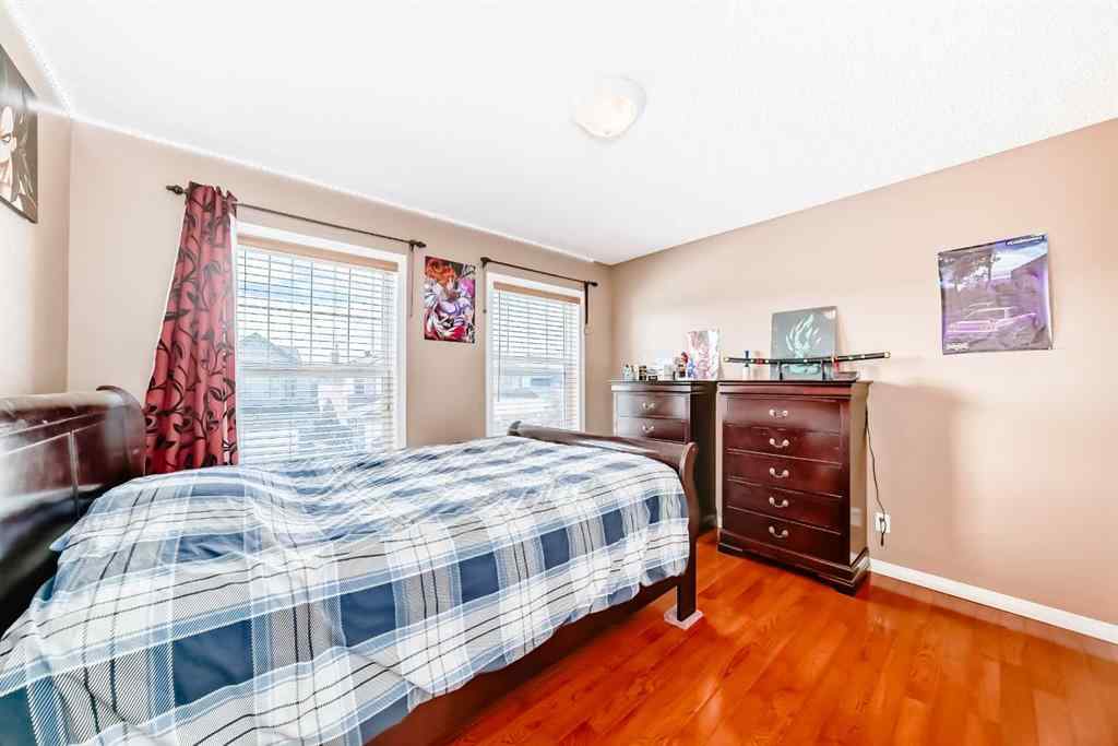 MLS® A2242078 - 148 Saddlecrest Gardens NE in Saddle Ridge Calgary, Residential