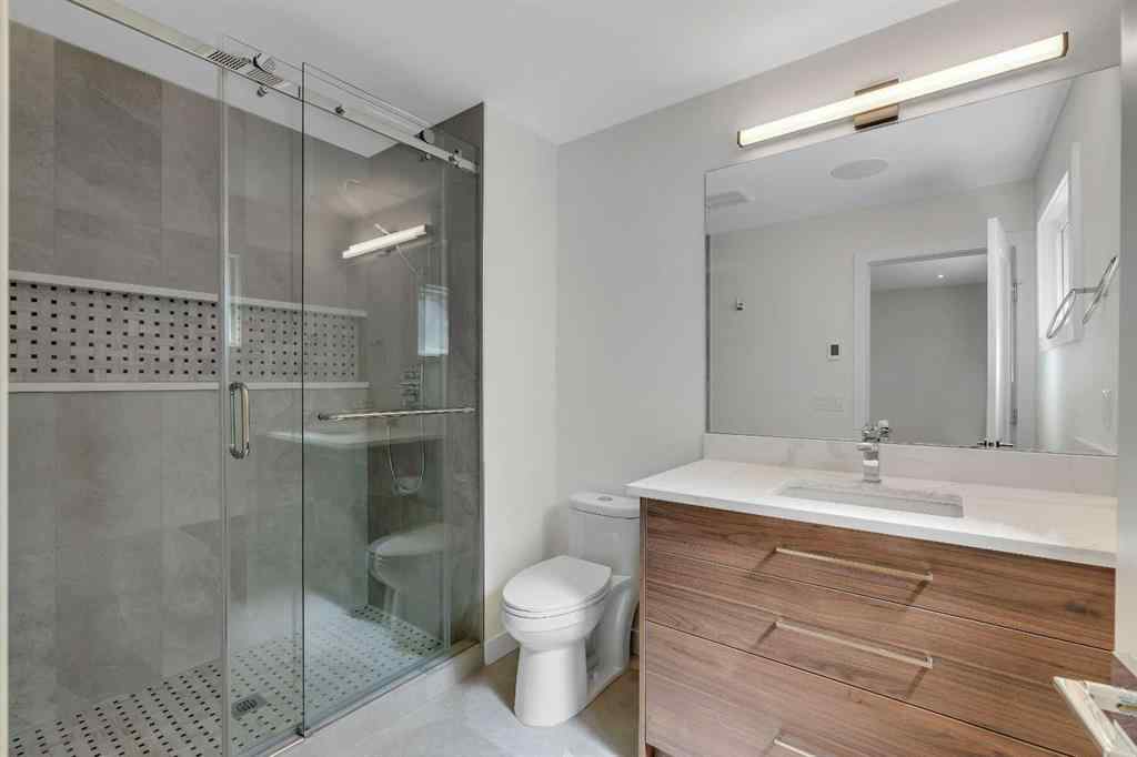 MLS® A2242097 - 10704 Oakfield Drive SW in Cedarbrae Calgary, Residential
