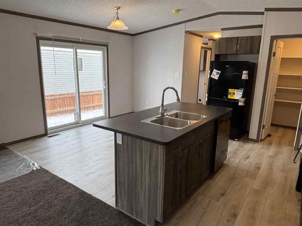 MLS® A2242104 - 24 Homestead Way  in NONE High River, Mobile