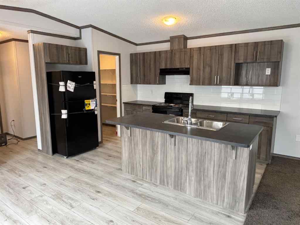 MLS® A2242104 - 24 Homestead Way  in NONE High River, Mobile