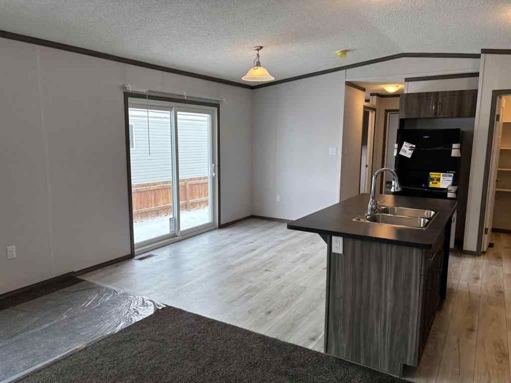 MLS® A2242104 - 24 Homestead Way  in NONE High River, Mobile