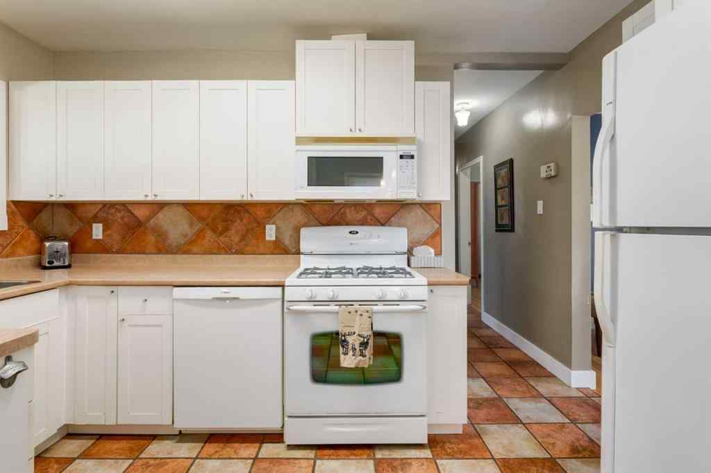 MLS® A2242112 - 202 27 Avenue NE in Tuxedo Park Calgary, Residential