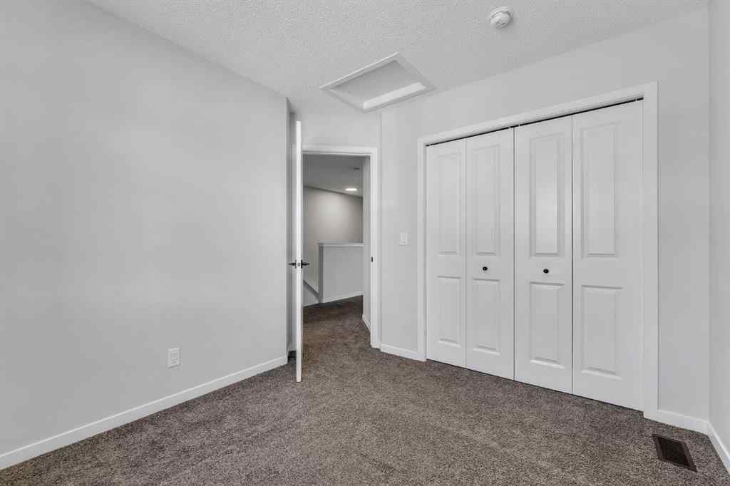 MLS® A2242156 - 218 Edith Road NW in Glacier Ridge Calgary, Residential