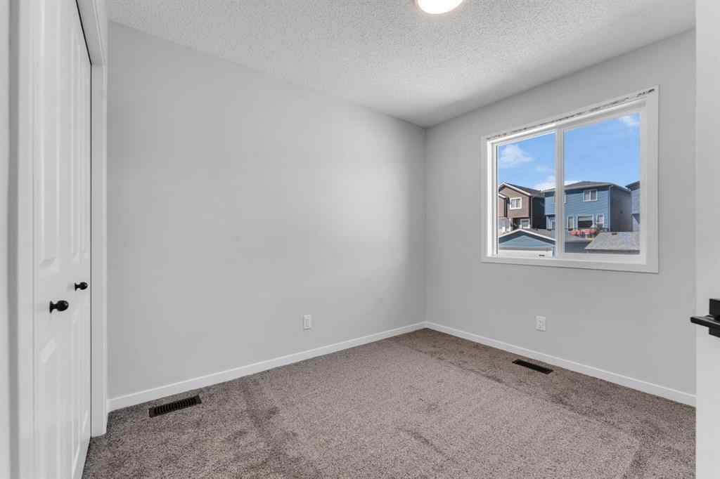 MLS® A2242156 - 218 Edith Road NW in Glacier Ridge Calgary, Residential