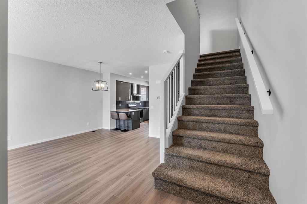 MLS® A2242156 - 218 Edith Road NW in Glacier Ridge Calgary, Residential