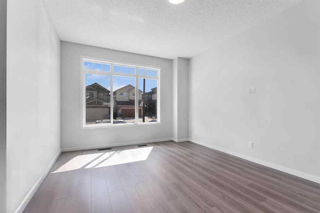 MLS® A2242156 - 218 Edith Road NW in Glacier Ridge Calgary, Residential