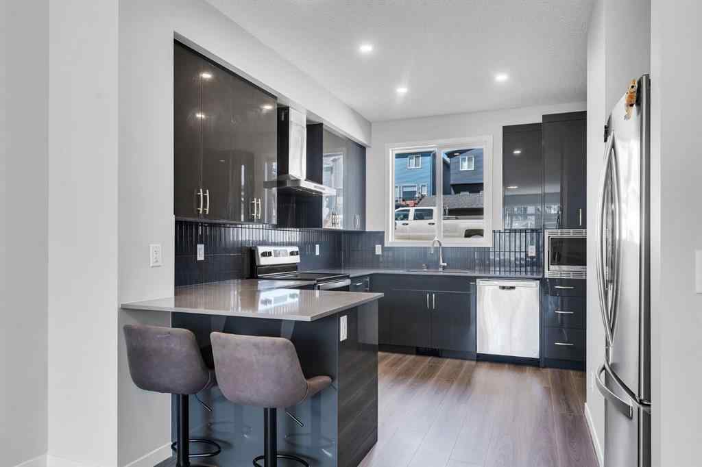 MLS® A2242156 - 218 Edith Road NW in Glacier Ridge Calgary, Residential