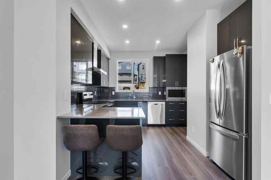 MLS® A2242156 - 218 Edith Road NW in Glacier Ridge Calgary, Residential