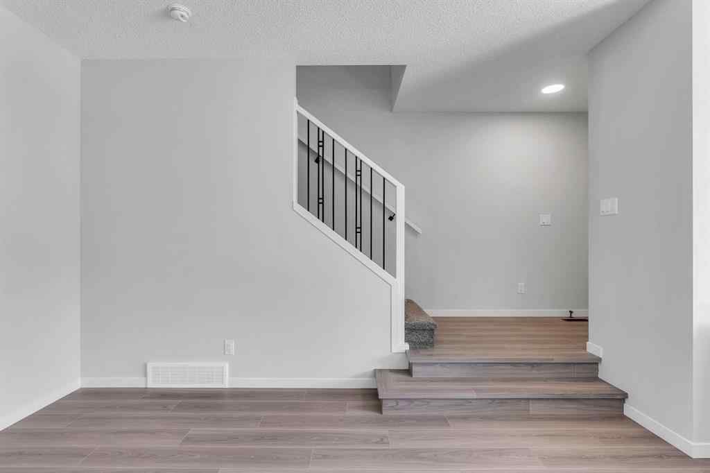 MLS® A2242156 - 218 Edith Road NW in Glacier Ridge Calgary, Residential