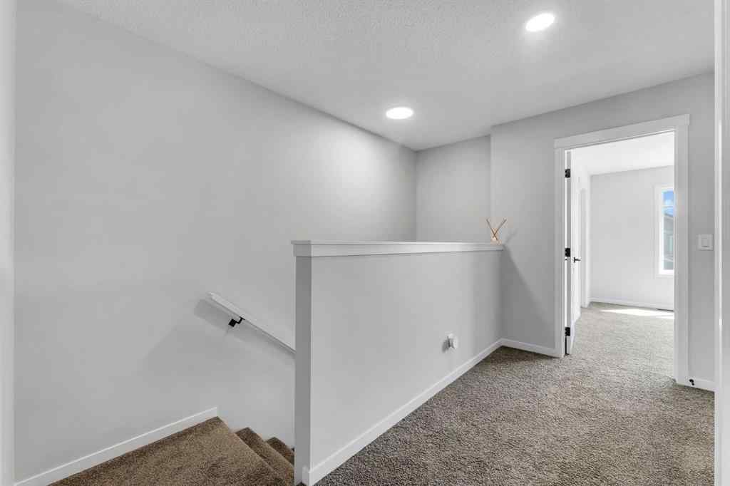 MLS® A2242156 - 218 Edith Road NW in Glacier Ridge Calgary, Residential