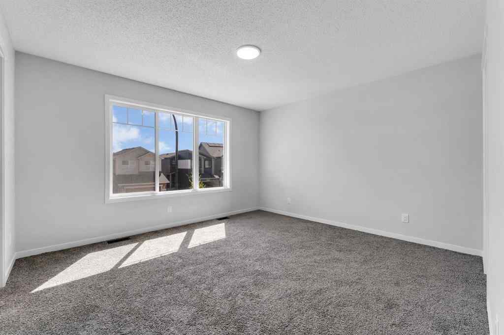 MLS® A2242156 - 218 Edith Road NW in Glacier Ridge Calgary, Residential