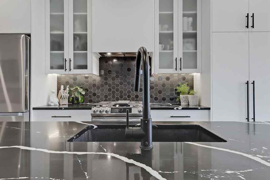 MLS® A2242191 - 1440 26A Street SW in Shaganappi Calgary, Residential